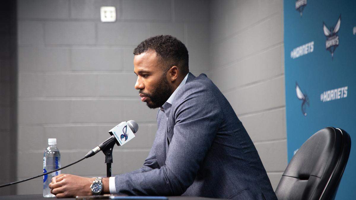 Jeff Peterson, the Charlotte Hornets’ president of basketball operations, engages with the press at the Spectrum Center on Monday, April 14, 2025. 