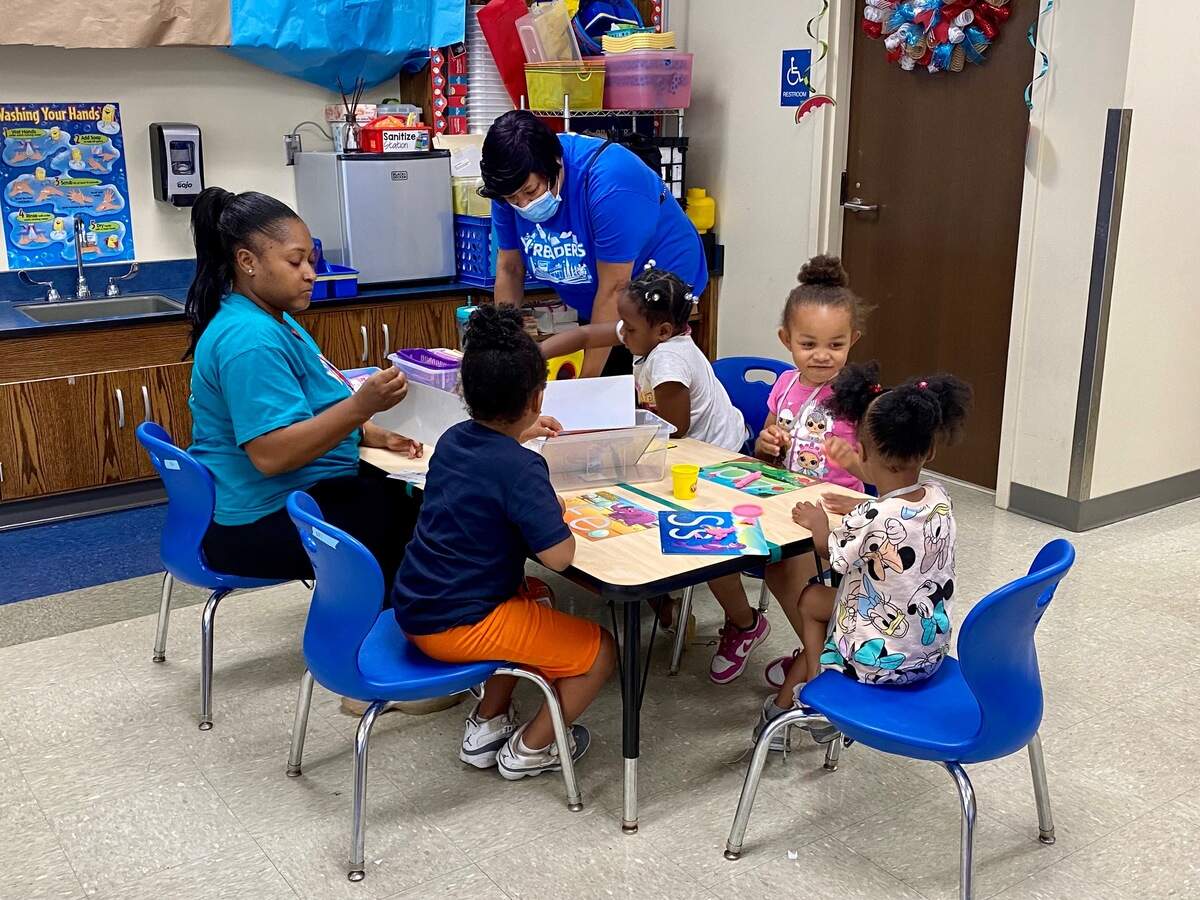 Rising kindergarteners at Renaissance West STEAM Academy work on reading skills through the YMCA’s Y Readers summer program.