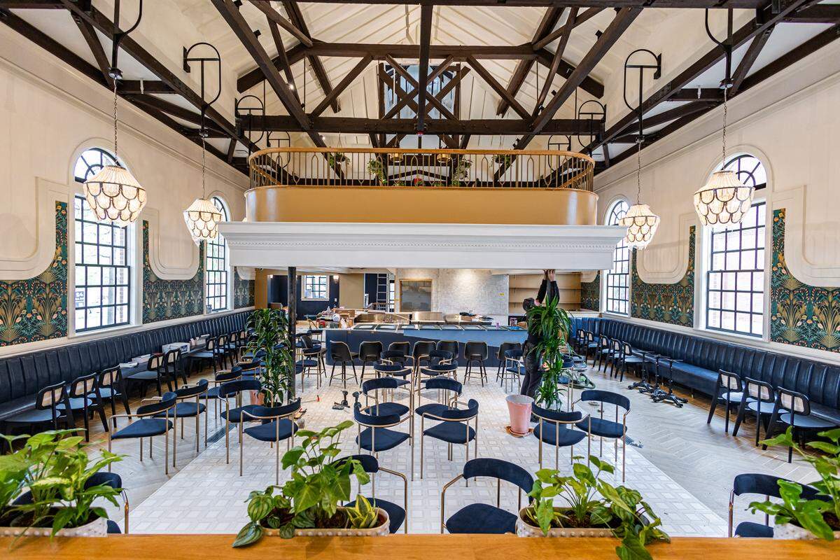 Natural light floods the main dining area at Leluia Hall.