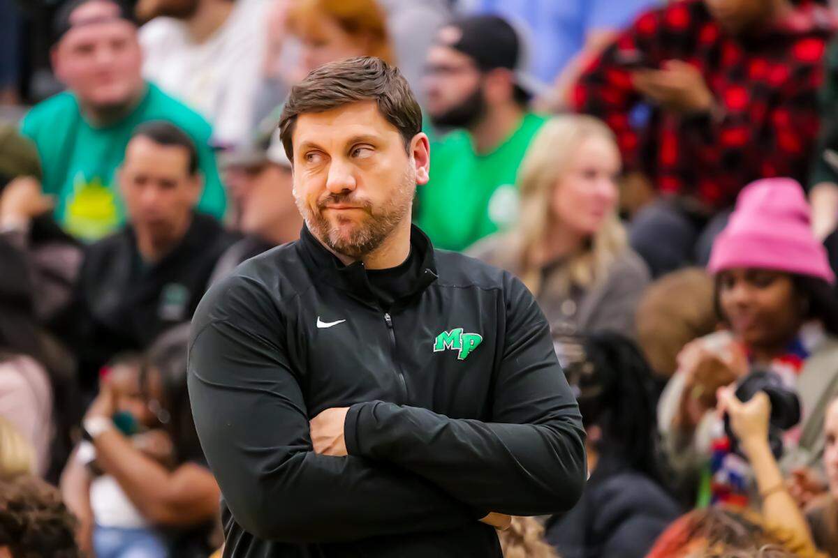 Myers Park head Coach Scott Taylor Looks Back Over His Shoulder After The Referee Calls On Walk On His Team At NCHSAA Second round Mens Basketball playoffs Myers Park Vs Ardrey Kell At Myers Park Highschool
