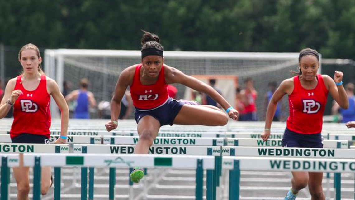 Providence Day’s Falon Spearman (center).