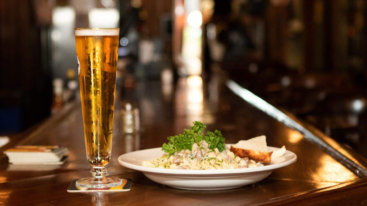 Beer and Stroganoff at the bar at Alexander Michael’s in Uptown Charlotte. Al Mike’s is located in Fourth Ward uptown Charlotte.
