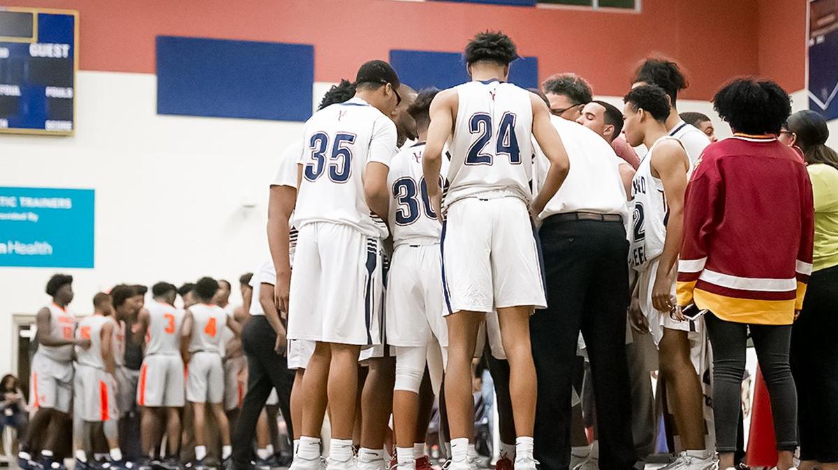 Vance and Mallard Creek gather during a late 1st half timeout.