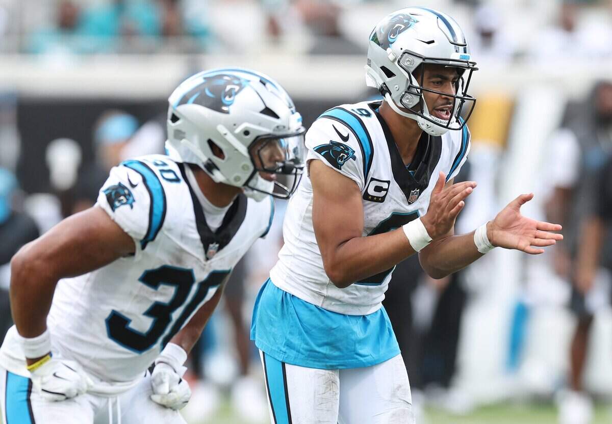 Carolina Panthers quarterback Bryce Young, right, calls out at the line of scrimmage during action against the Jacksonville Jaguars on Sunday, September 7, 2025 at Everbank Stadium in Jacksonville, Florida. The Jaguars defeated the Panthers 26-10.