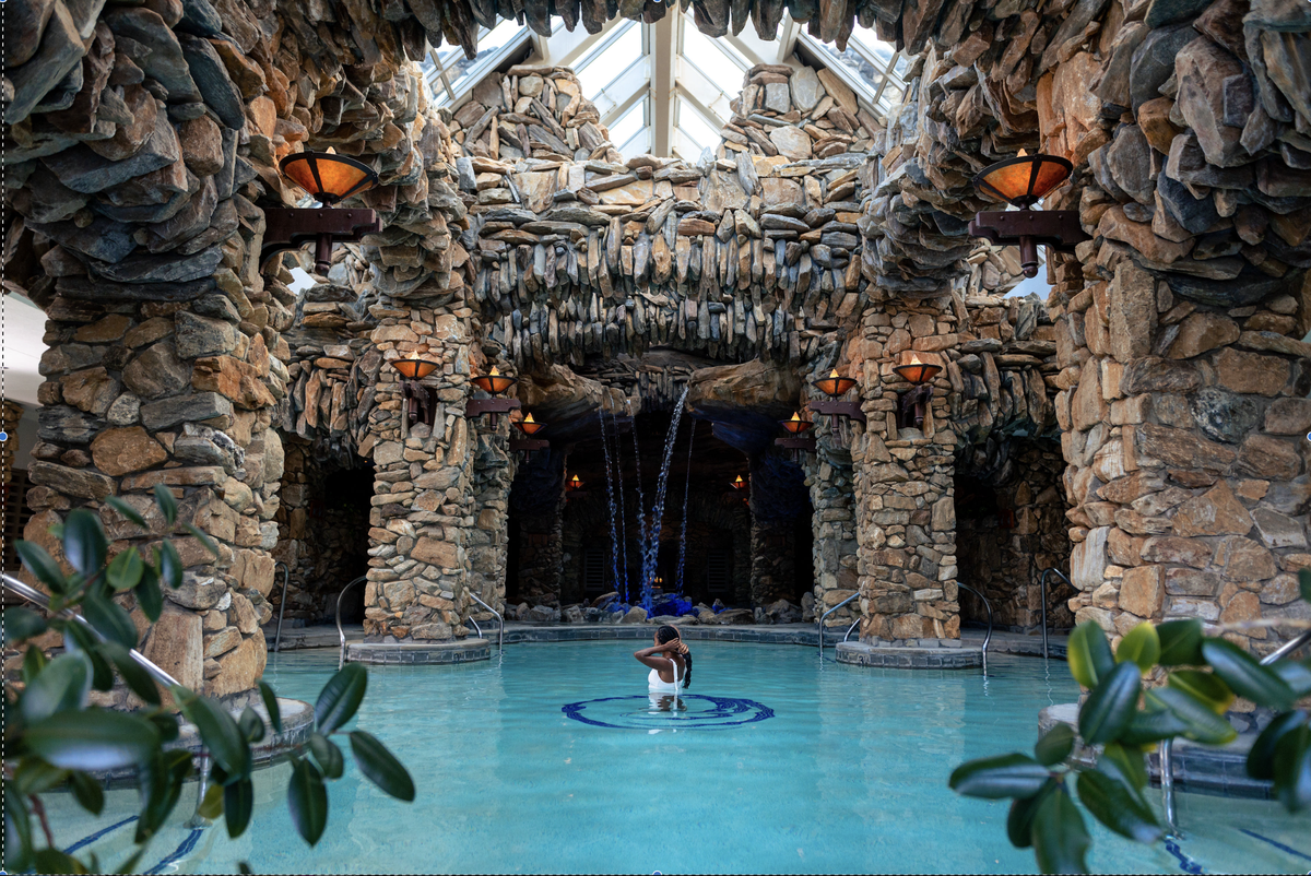 You’ll have to book a room at the Omni Grove Park Inn and reserve a day pass to use the spa facility, which features mineral pools with underwater music and waterfall pools, plus more.