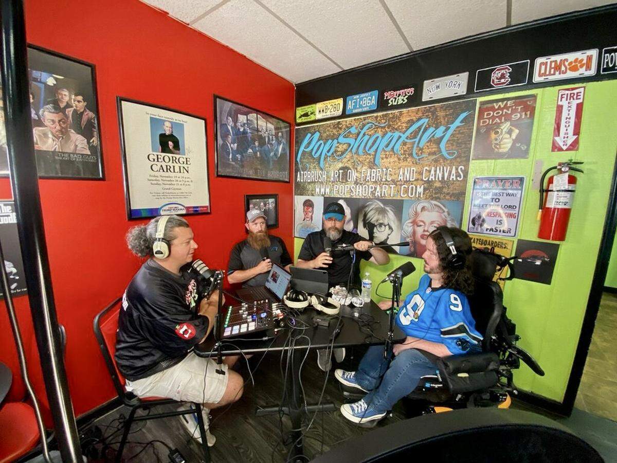 The Carolina Cat Chronicles podcast records live from Monster Subs and Grub in Spartanburg during Carolina Panthers 2023 training camp. From left to right: Tony Dunn, Greg Schlager, Cody Kelly, Cody Lachney.