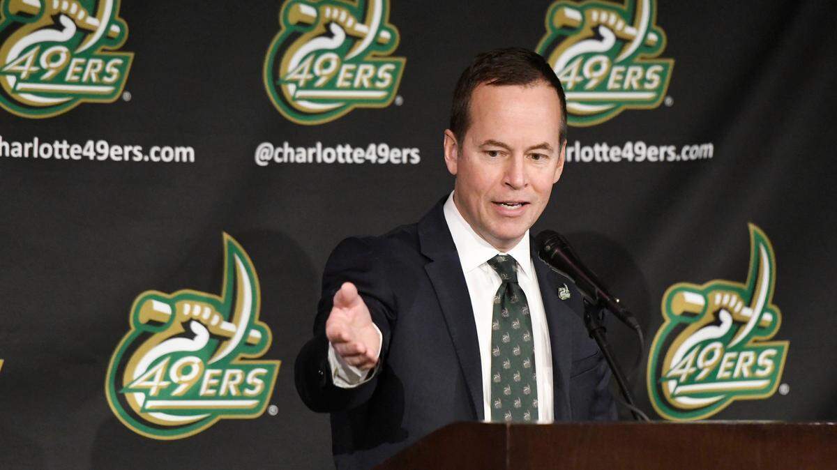 Charlotte 49ers athletics director Mike Hill grew up in Clemson, S.C., and enjoyed going to Clemson Tiger football games.