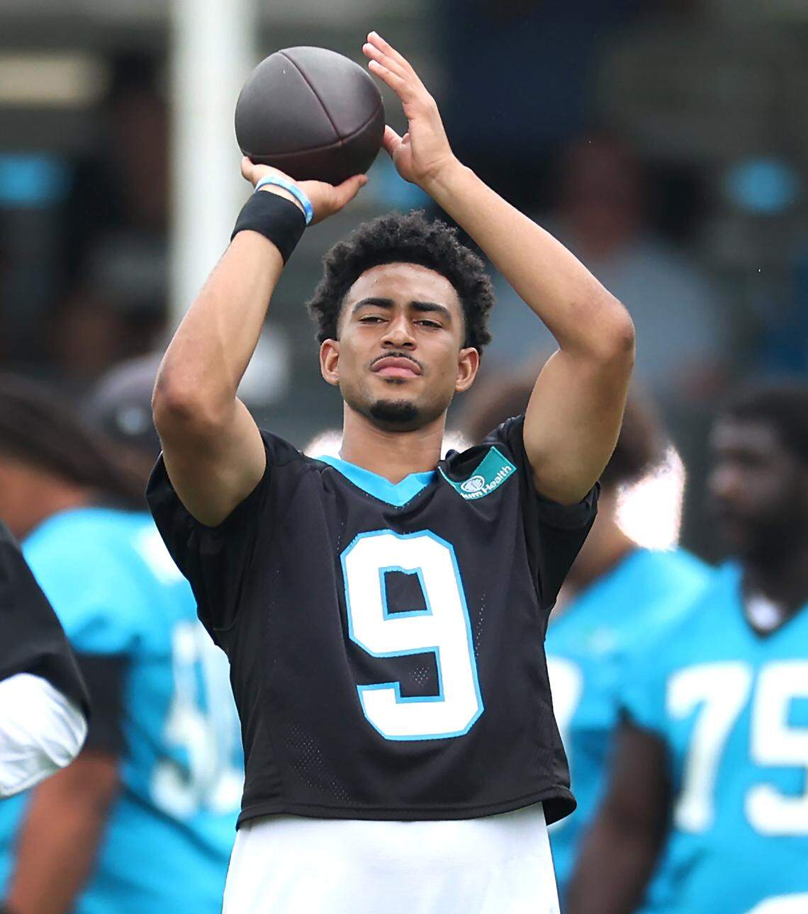 Carolina Panthers quarterback Bryce Young works on his form during a break in drills on Thursday, July 25, 2024.