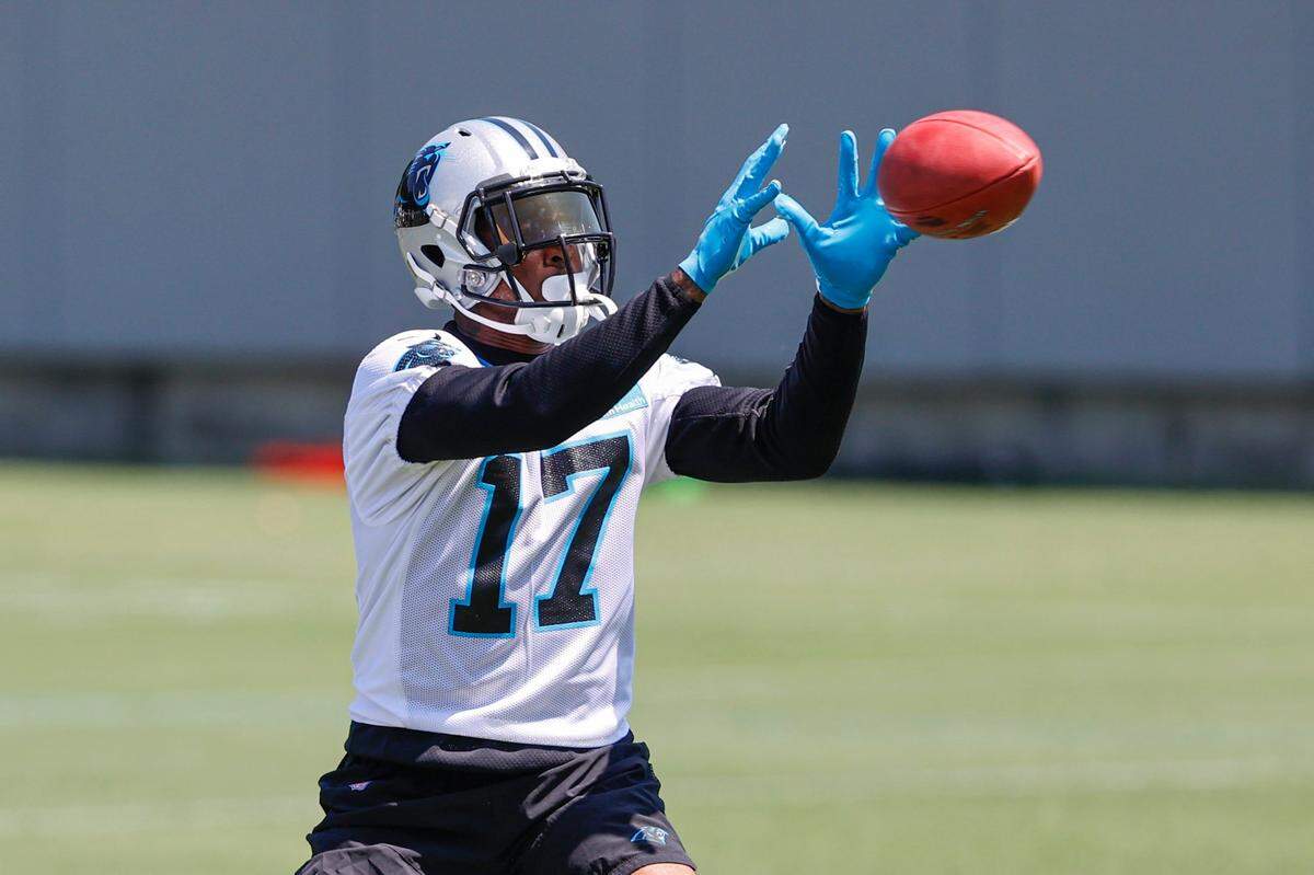 Carolina Panthers wide receiver Rashard Higgins catches a pass during NFL football practice in Charlotte, N.C., Wednesday, June 1, 2022. (AP Photo/Nell Redmond)