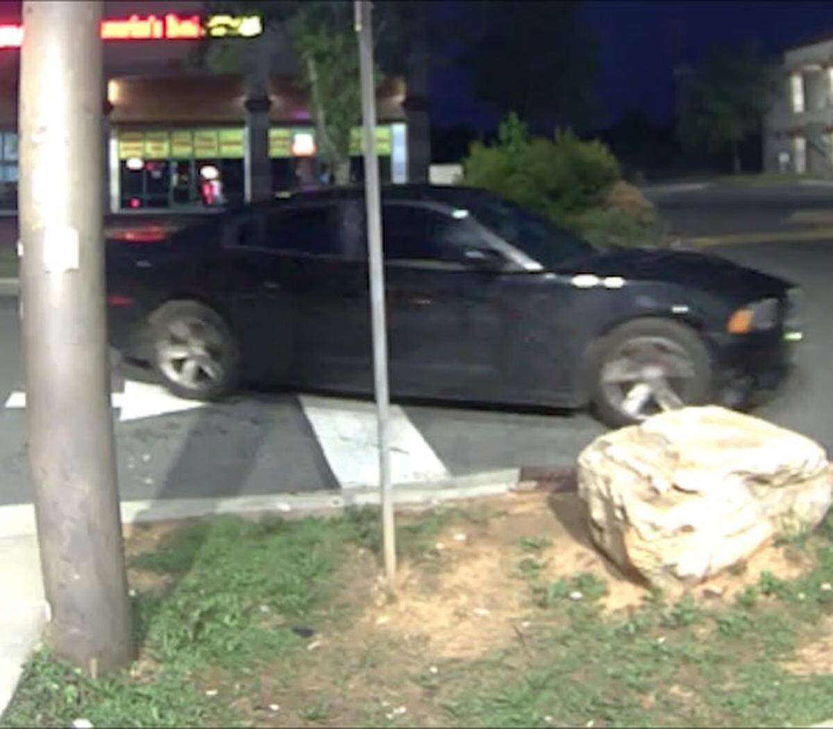 Charlotte-Mecklenburg Police released photos of a suspect and a getaway vehicle in the robbery and shooting death of Karen Baker on July 13, 2022.