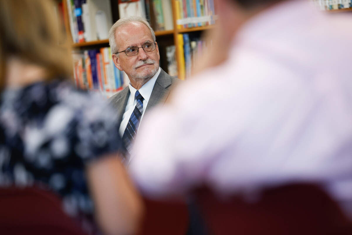 CMS interim superintendent Hugh Hattabaugh listens as questions are asked during a tour of West Charlotte High School in Charlotte, N.C., Friday, Aug. 26, 2022.