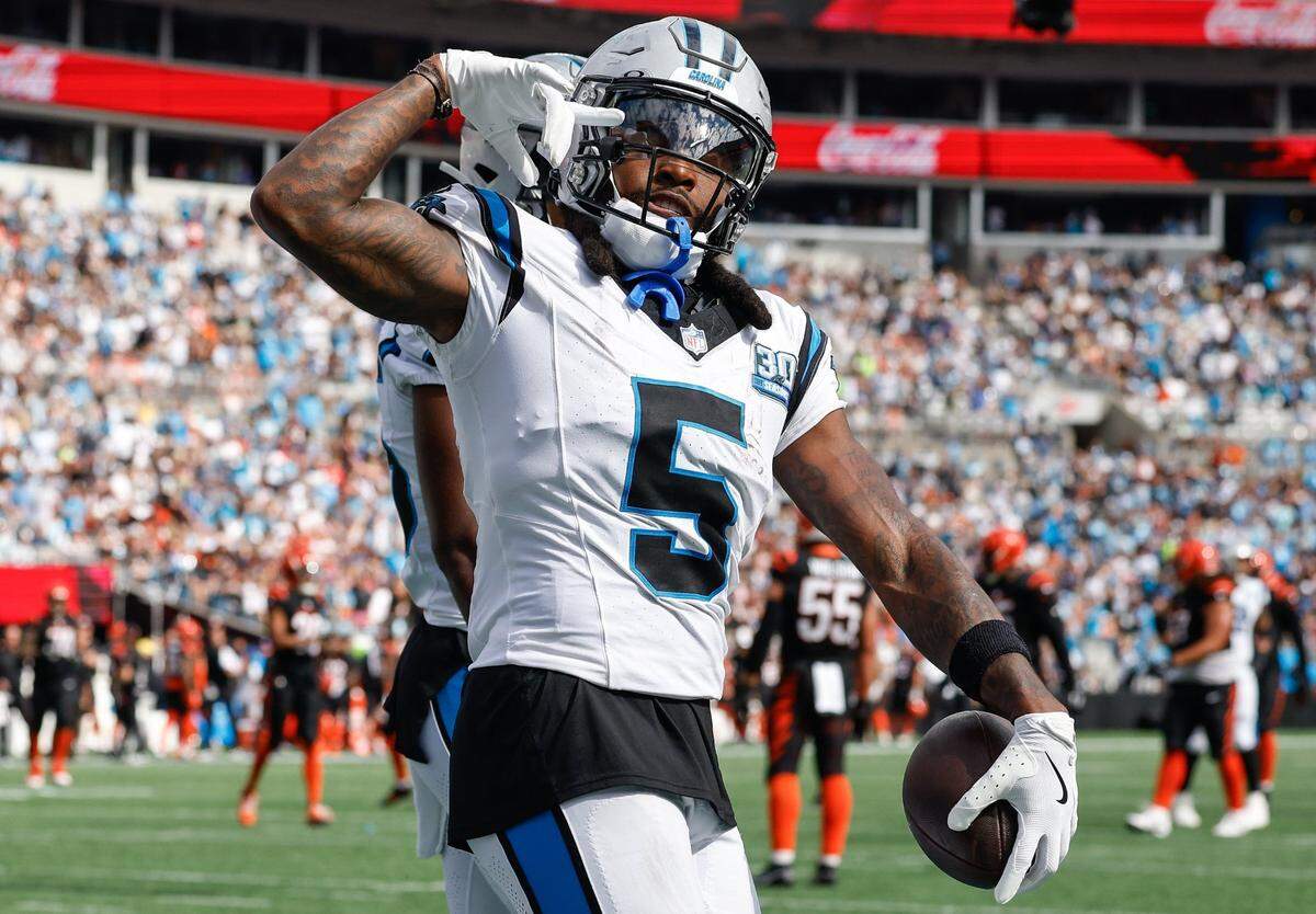 Panthers wide receiver Diontae Johnson celebrates scoring a touchdown against Cincinnati Sunday. Johnson had seven catches for 83 yards, but the Panthers lost, 34-24.