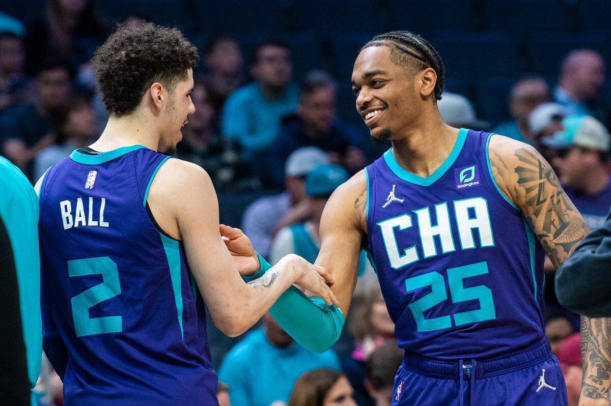 LaMelo Ball (2), PJ Washington and the rest of the Hornets are smiling: They’ve clinched a spot in the NBA Play-In Tournament, which takes place April 12-15.