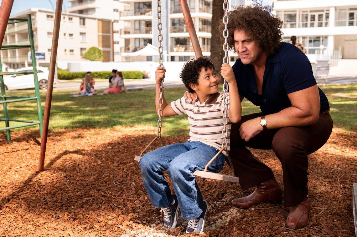 Matt Willig (right) portrays Andre the Giant in the NBC sitcom “Young Rock,” based on the early life of Dwayne “The Rock” Johnson. Willig played 29 games for the Carolina Panthers in 2003 and 2004 as an offensive lineman.