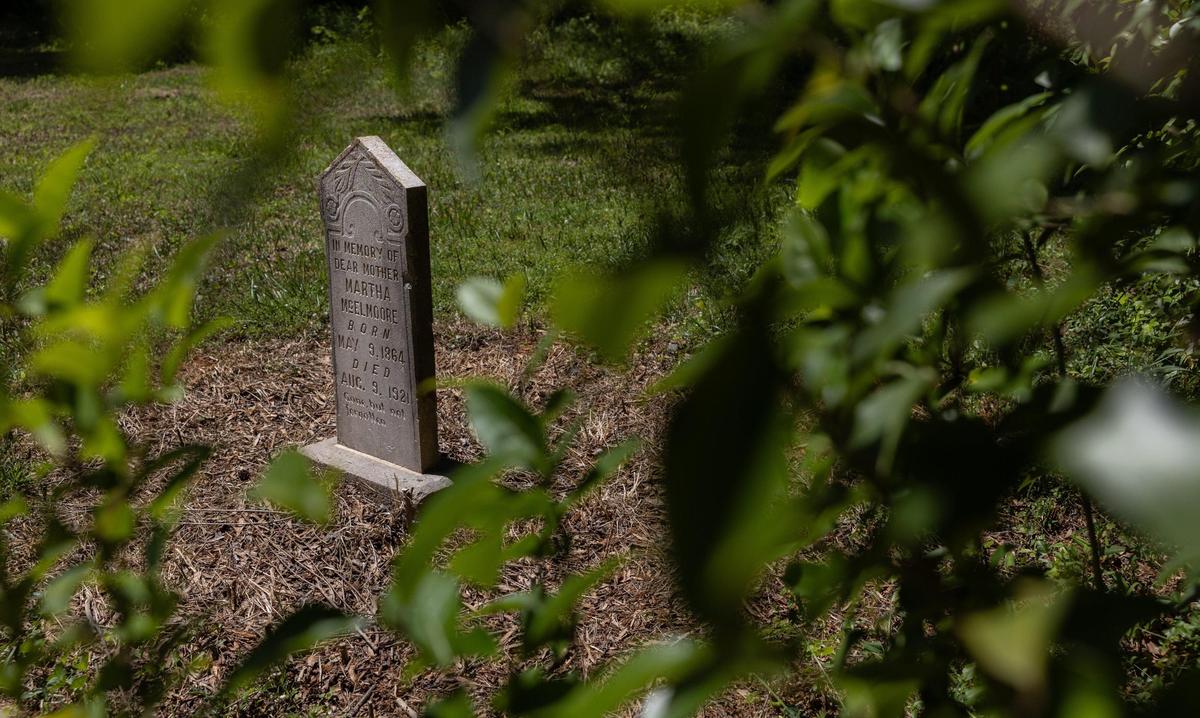 One of the remaining headstones at Biddleville Cemetery in Charlotte, N.C., on Friday, May 2, 2025. Despite being a historical Black cemetery, located in one of Charlotte’s oldest historic Black Neighborhoods, it has been forgotten multiple times. Since as early as 1982, good Samaritans in the community have taken it upon themselves to clean up and look after the cemetery. Ten years after the cemetery’s historical designation, there is still has no signage for it.