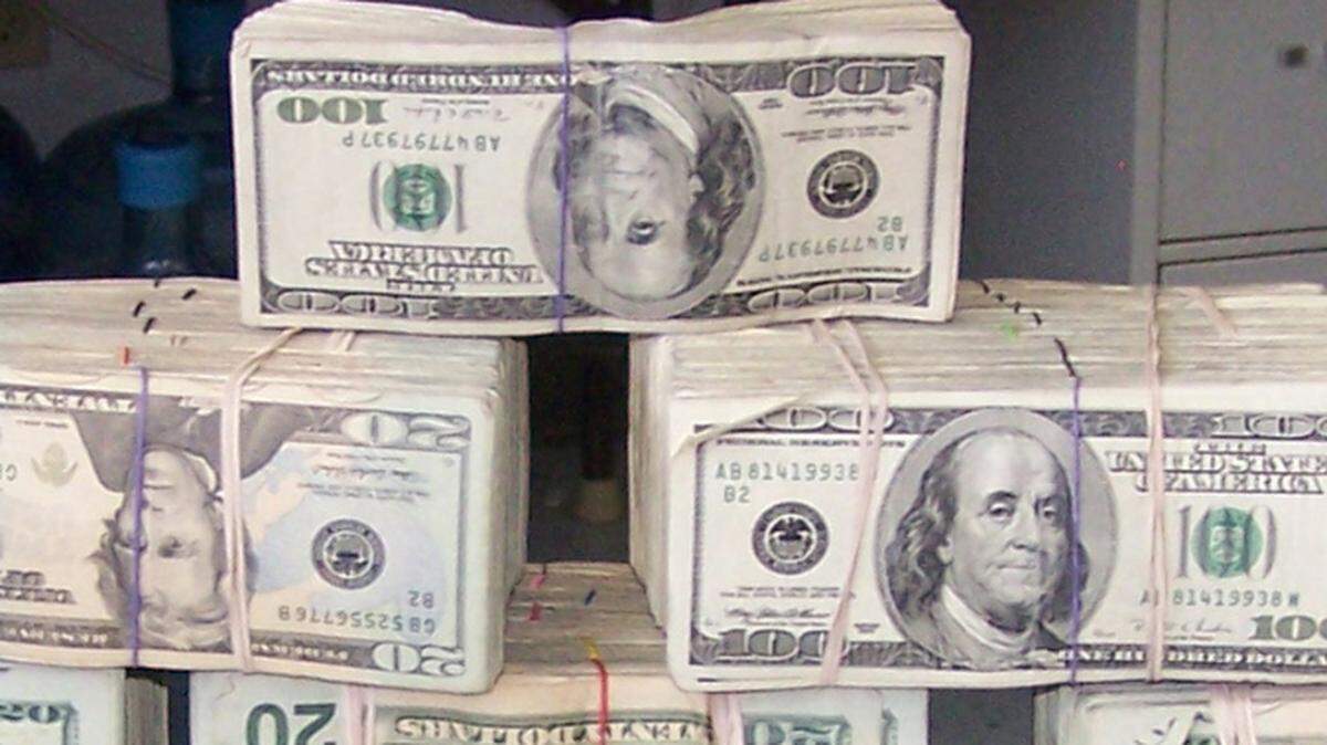 This AP file photo from July 2008 shows money seized by police in Saraland, Ala. On Monday, April 12, 2021, a judge in Mooresville, NC, repeated her threat to jail top town and police officials for not returning money seized from a Connecticut man in a warrantless search.