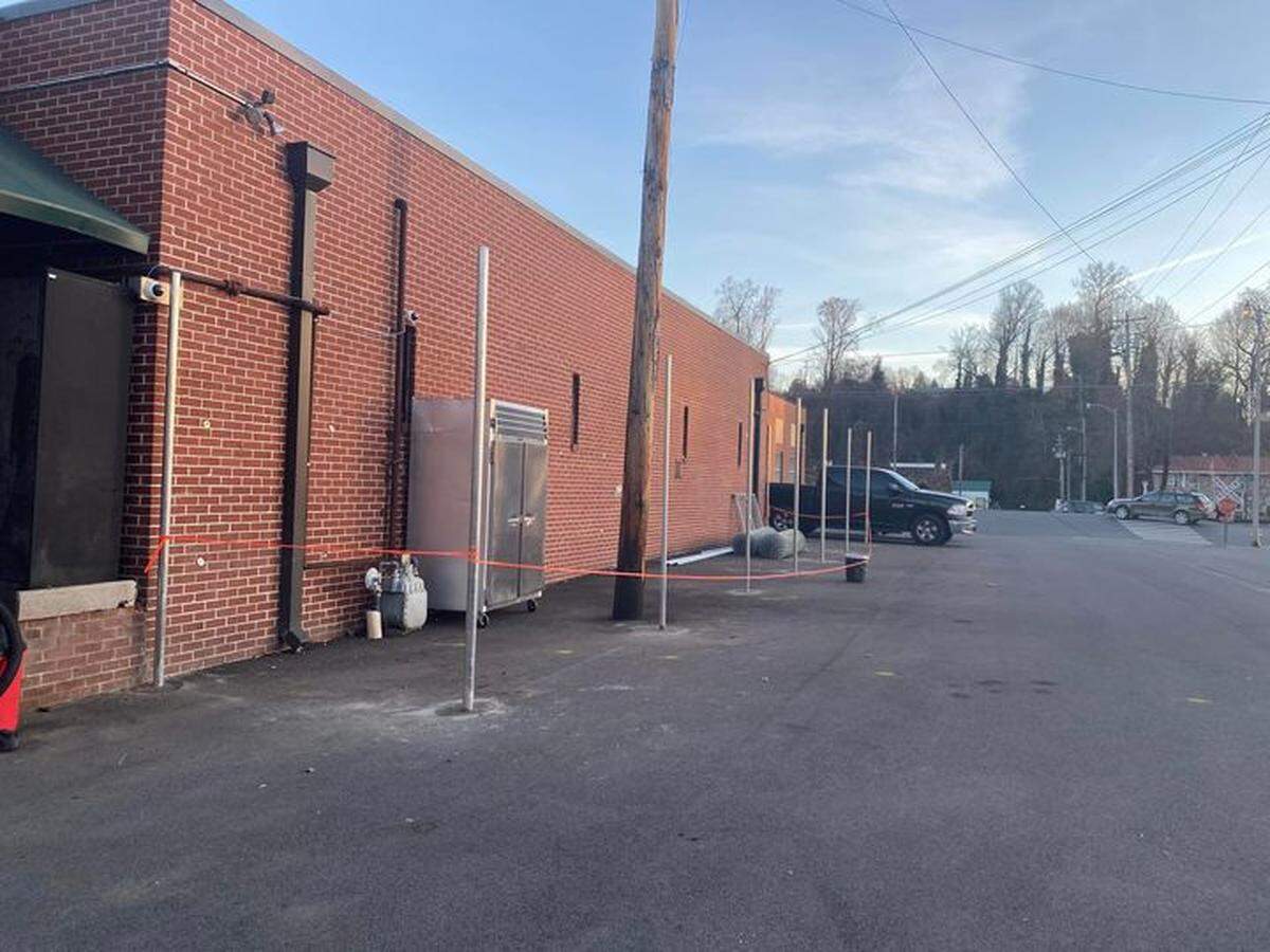 Fence construction is underway around the Cocke County jail, after officials realized drug smugglers were putting holes in the walls.