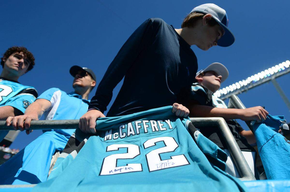 Carolina Panthers fan Luke Simmons of Whiteville, NC brought his jersey of former Carolina Panthers running back Christian McCaffrey to be autographed by players prior to the team’s game against the Tampa Bay Buccaneers on Sunday, October 23, 2022.