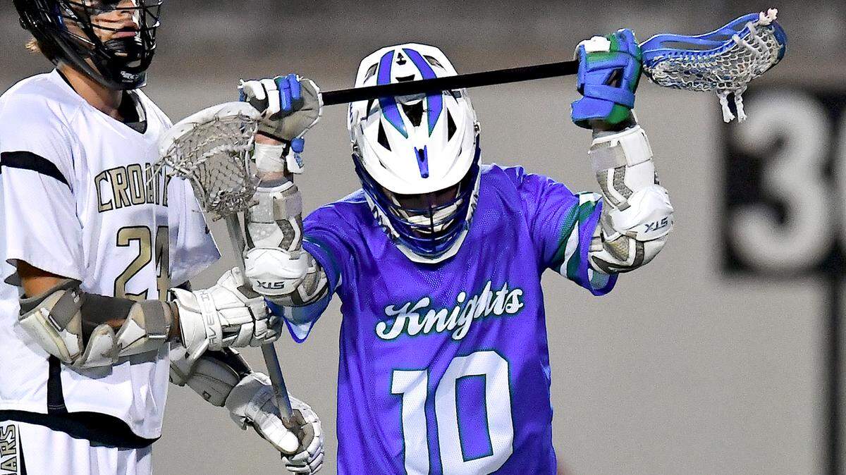 Lake Norman Charter’s Tristan English (10) reacts after missing a shot on goal against Croatan late in the first half. The Lake Norman Charter Knights and the Croatan Cougars met in the NCHSAA 1A/2A/3A Boys Lacrosse Championship in Durham, N.C on May 30, 2025.