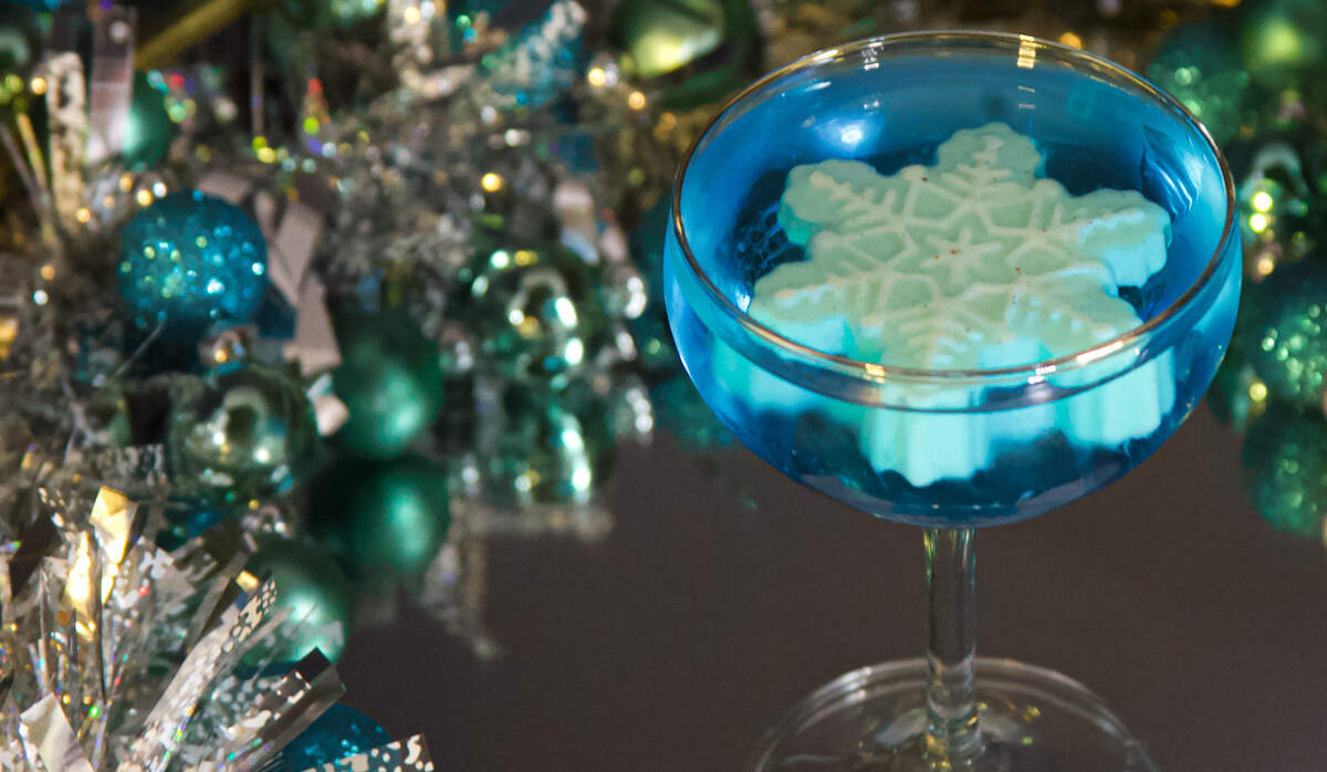 The Blue Christmas cocktail at Haberdish includes a sweet cream and cinnamon ice cube.