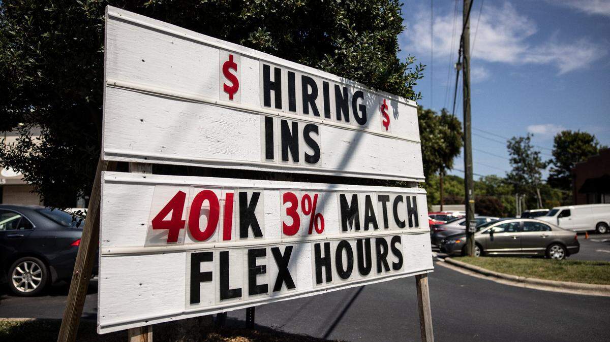 Hiring sign outside of Dilworth Neighborhood Grille in Charlotte, N.C., on Friday, September 3, 2021. Federal pandemic unemployment benefits are set to expire Saturday in North Carolina, and more than 100,000 residents will be affected by the change.