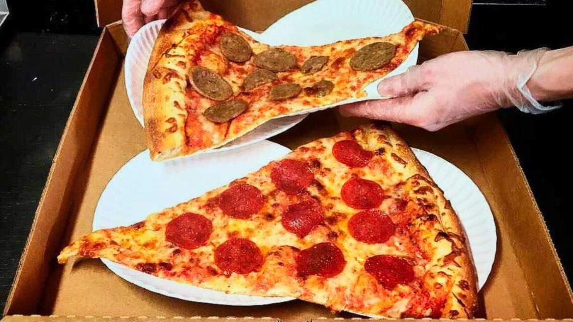 Sausage and pepperoni pizza from Benny Pennello’s in Charlotte, NC.