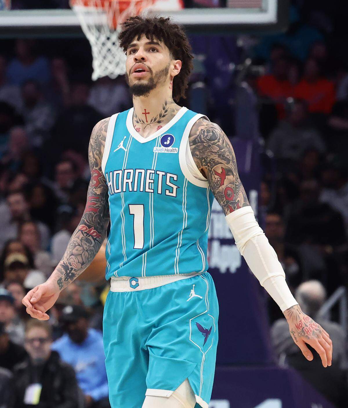Charlotte Hornets guard LaMelo Ball walks off the floor looking high into the stands during action against the Cleveland Cavaliers at Spectrum Center in Charlotte, North Carolina, on Jan. 21, 2026. The Cavaliers defeated the Hornets 94-87.