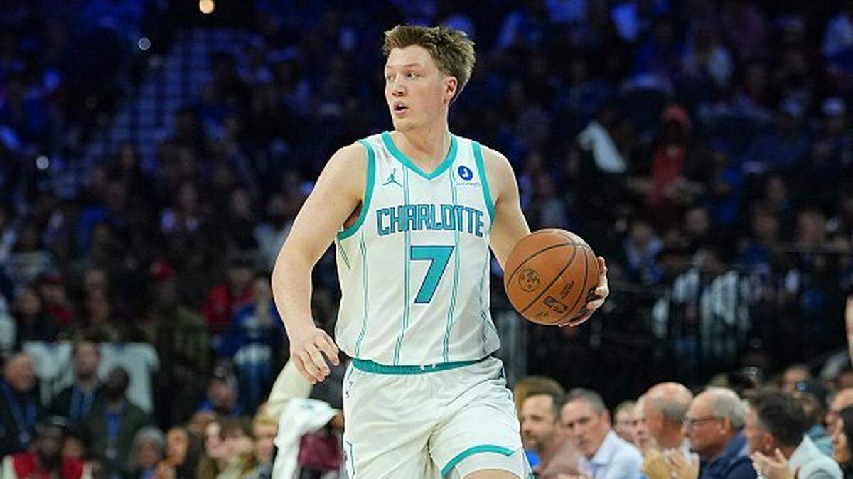 Kon Knueppel #7 of the Charlotte Hornets dribbles the ball against the Philadelphia 76ers at Xfinity Mobile Arena on October 25, 2025 in Philadelphia, Pennsylvania. The 76ers defeated the Hornets 125-121. 