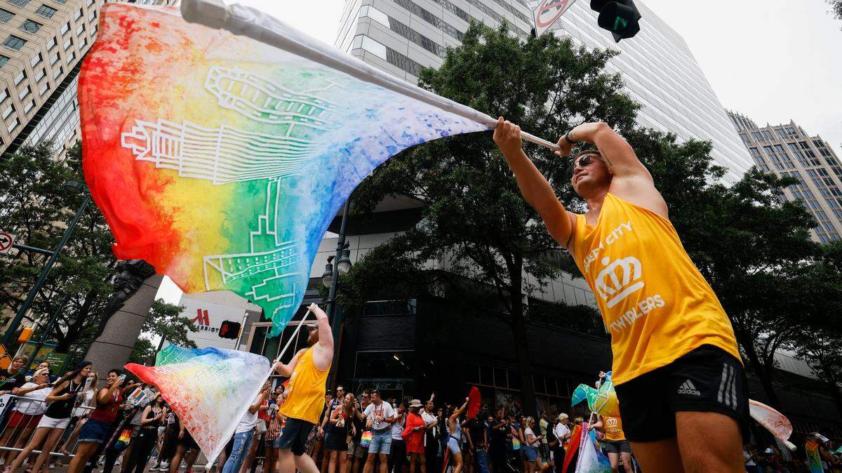 Members of the Queen City Twirlers perform during the Charlotte Pride Parade through uptown Charlotte, N.C., Sunday, Aug. 21, 2022.