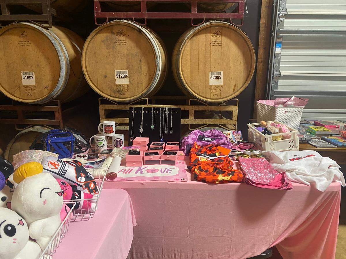 At Divine Barrel Brewing in NoDa the night before the Aespa concert in Charlotte, vendors such as Kawaii Kove sold albums, clothing and other K-pop related merchandise.