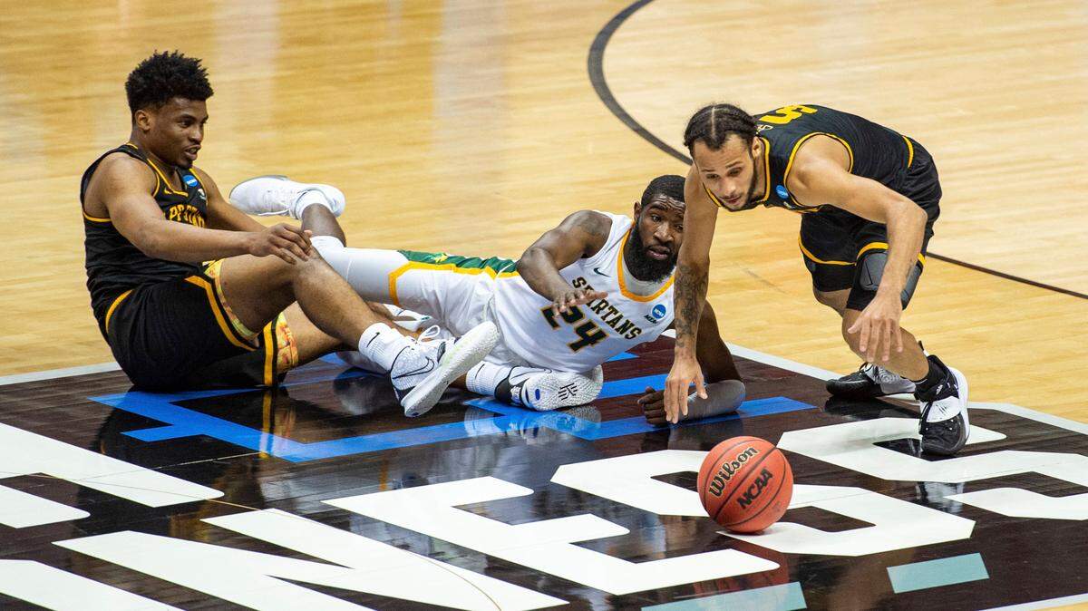 Appalachian State guard Michael Almonacy (5) goes after the ball during the second half of a First Four game against Norfolk State in the NCAA men’s college basketball tournament, Thursday, March 18, 2021, in Bloomington, Ind.