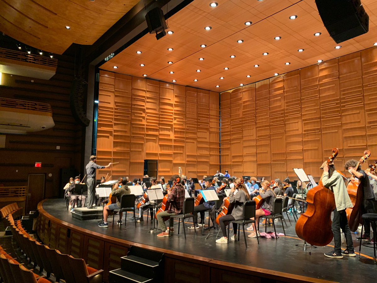Christopher James Lees leads a rehearsal of the Charlotte Symphony Youth Orchestra at Knight Theater.