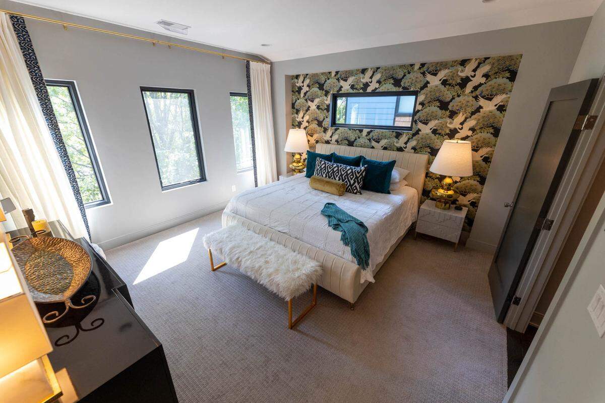Rachel and Craig Richards’ bedoom is on the third floor of their NoDa home.