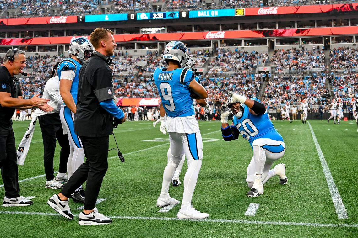 Carolina Panthers quarterback Bryce Young and offensive guard Robert Hunt celebrate a touchdown during their preseason game against the Cleveland Browns at Bank of America Stadium on Friday, August 8, 2025, in Charlotte.