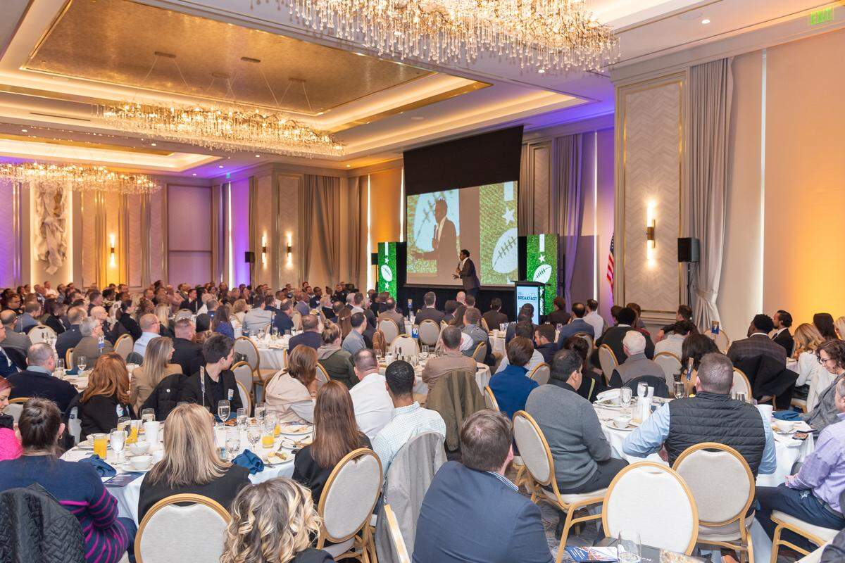 NFL legend Cris Carter shares his life story with hundreds at Carmel Country Club in Charlotte on Wednesday, January 8, 2025.