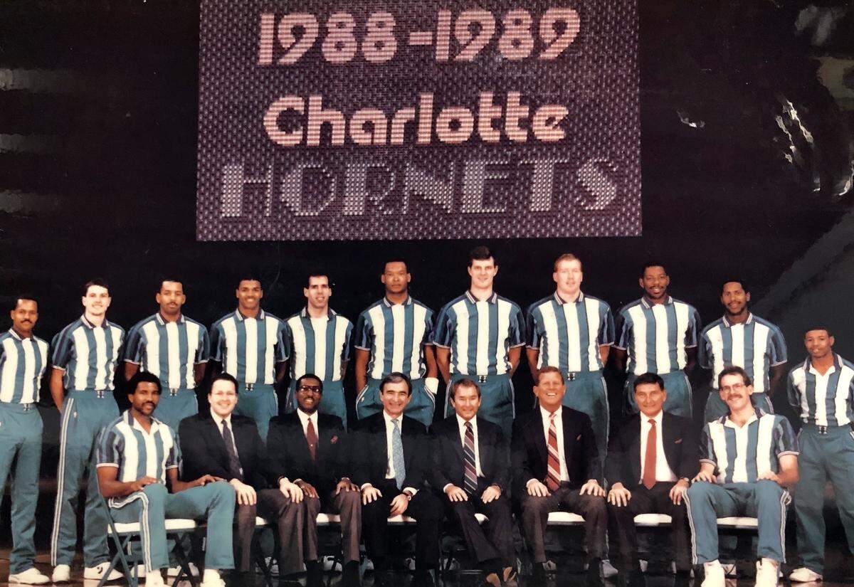 The first edition of the 1988-89 Charlotte Hornets lost 62 of 82 games, but the team entranced the city under general manager Carl Scheer (seated, fourth from left).