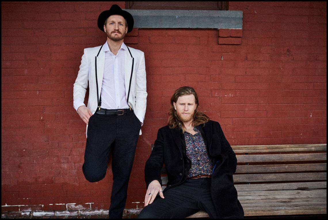 Founding Lumineers members Jeremiah Fraites (drums, percussion, piano), at left, and Wesley Schultz (lead vocals, guitar), seated.