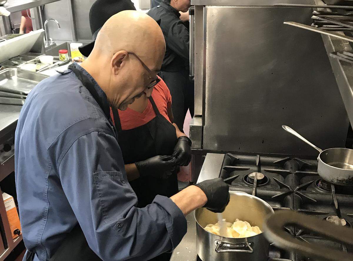 Chef Kamel Dahmani mixes parsnips with a little salt and pepper, milk and butter, then blends them smooth.