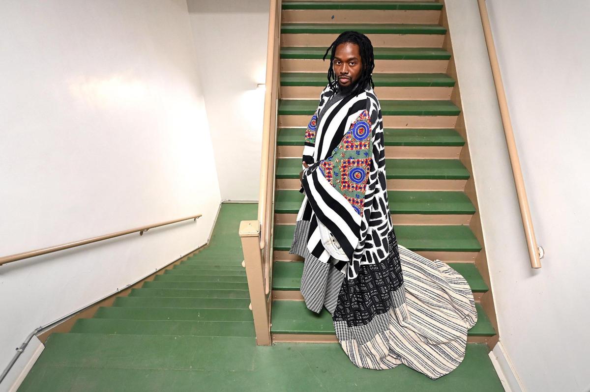 Will White Jr. is one of the local artists chosen by ArtPop Street Gallery to have his art displayed on billboards around the region. White is wearing a kimono he made that will go up on a billboard, then eventually it will be repurposed back to fashion.