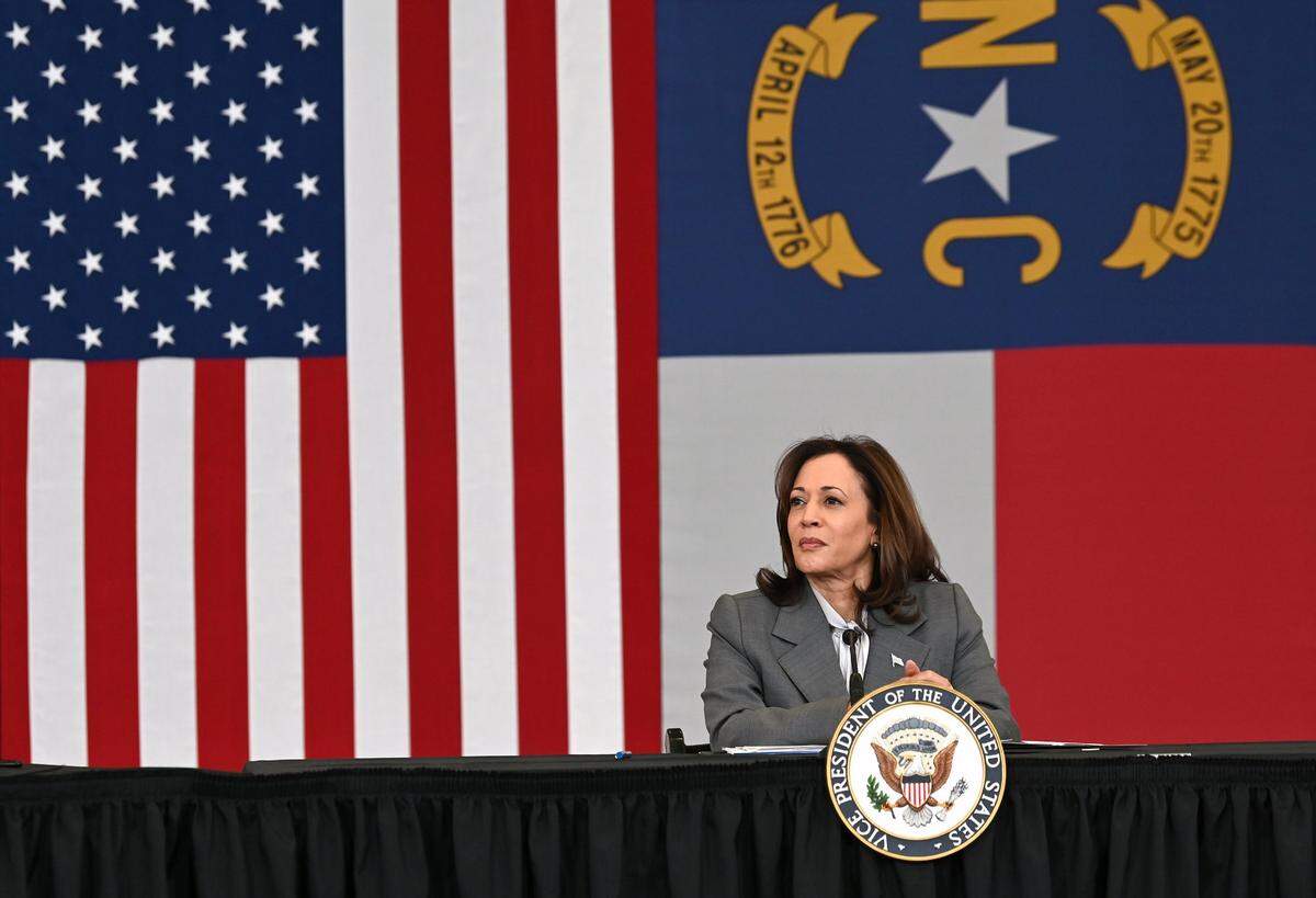 Vice President Kamala Harris, center, waits to speak at Eastway Middle School on Thursday, January 11, 2024. Harris visited Charlotte to highlight the Biden-Harris Administration latest actions to reduce gun violence. Harris held a roundtable with educators, counselors, parents gun safety advocates and local and state leaders to announce new funding from the Bipartisan Safer Communities Act. The act will help schools throughout the state and country to increase access to mental health resources for their students.