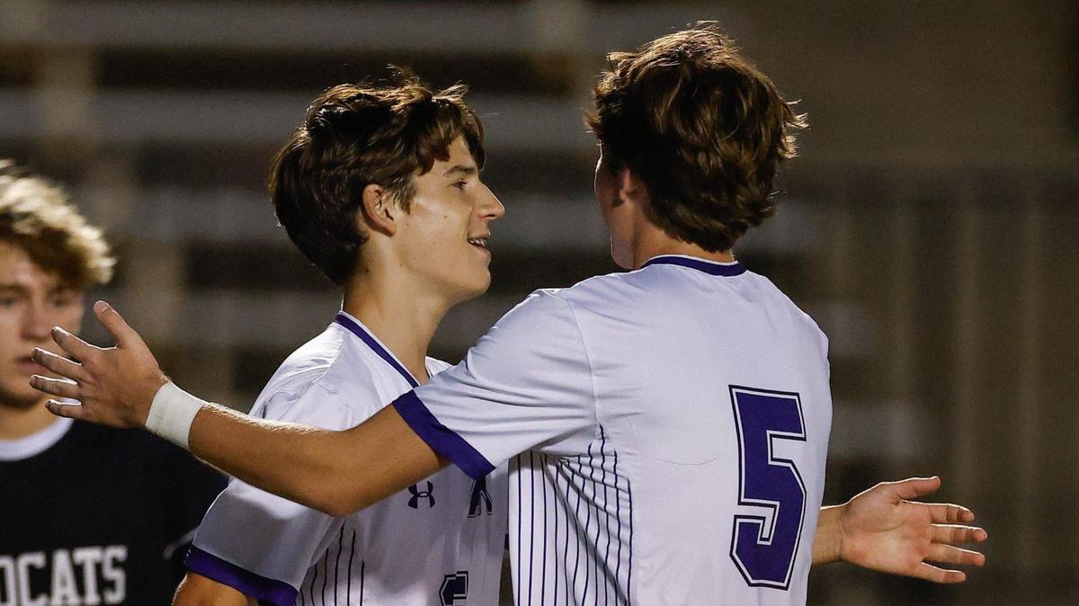 Ardrey Kell’s Nolan Reif, right, congratulates teammate Maksym Lenda on scoring the team’s second goal during the game against Lake Norman in Mooresville, NC on Tuesday, September 3, 2024.