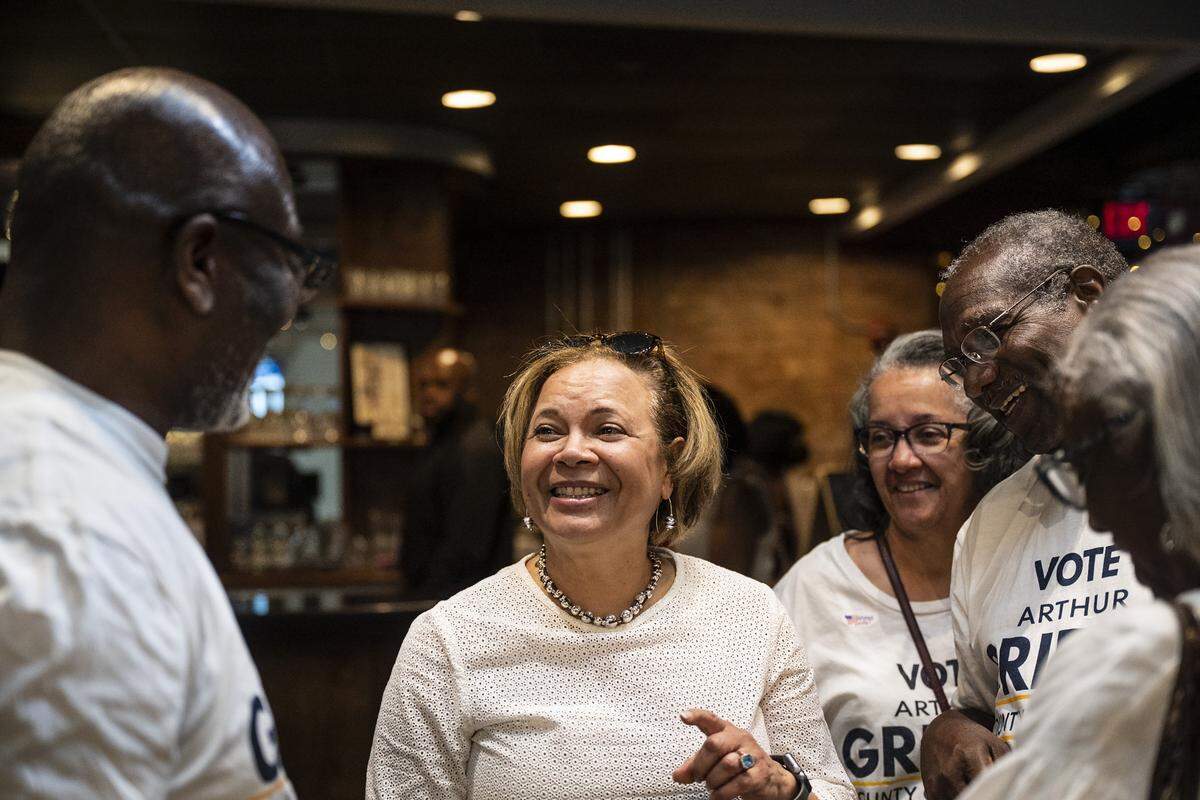 Charlotte's Democratic incumbent mayoral candidate, Vi Lyles, second from left, makes an appearance at the end of the Black Political Caucus’ watch party at Studio 229 on Tuesday, May 17, 2022 in Charlotte.