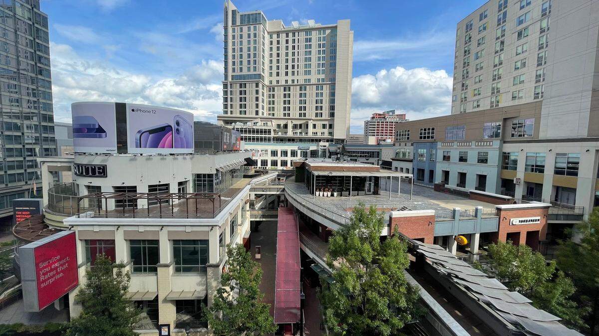 Epicentre in uptown Charlotte, a draw for restaurants, bars and entertainment, has little foot traffic on a recent June evening.