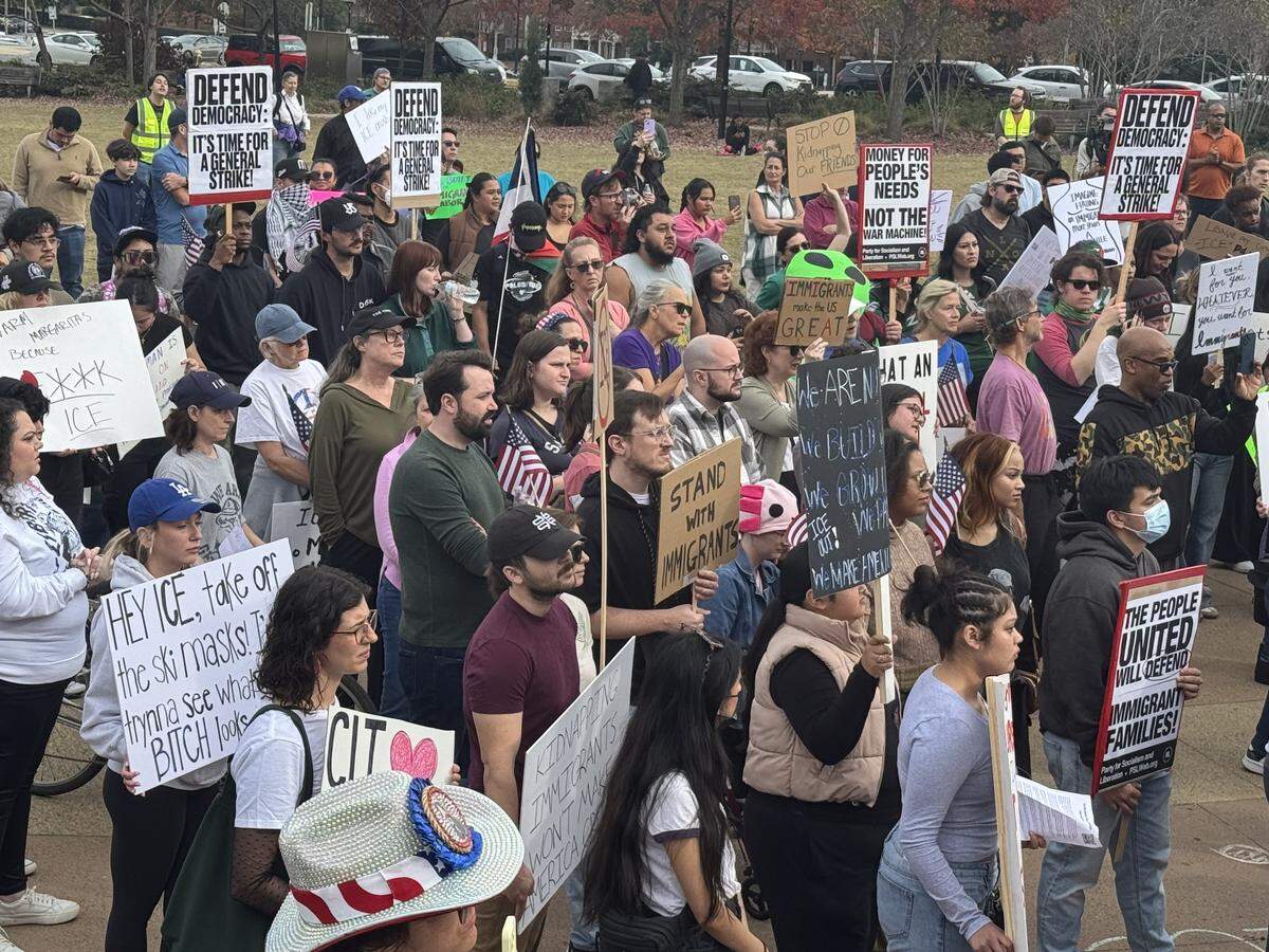 Hundreds march from First Ward Park in uptown Charlotte in the No Border Patrol protest on Saturday, Nov. 15, 2025