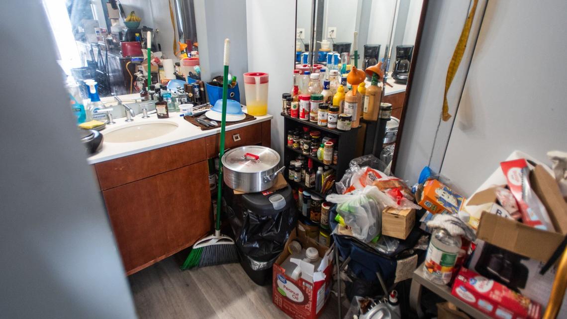 Household items stack along the walls at Ellen Miller and Eveco Haggins’s room at the Lamplighter Inn in Charlotte on June 6, 2024.