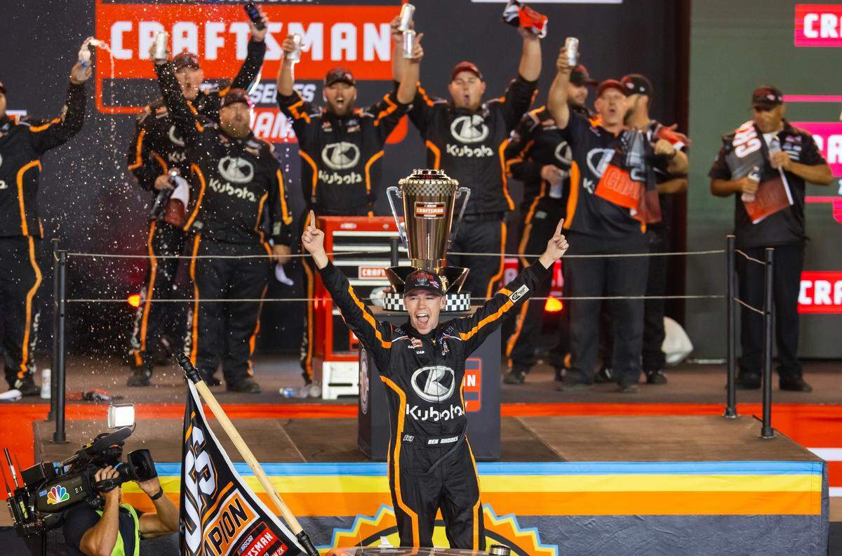 Nov 3, 2023; Avondale, Arizona, USA; NASCAR Truck Series driver Ben Rhodes celebrates after winning the Truck Series Championship during the Championship Race at Phoenix Raceway.