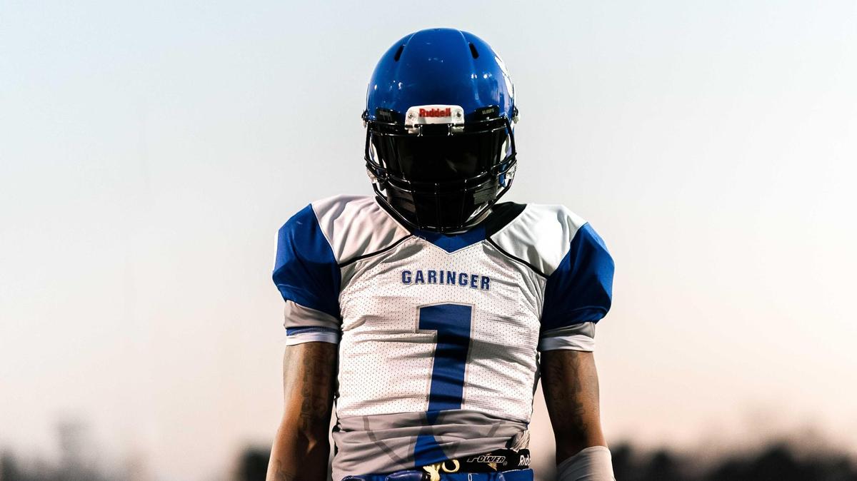 Garinger’s Zae Staten (1) runs through pre-game warmups.
