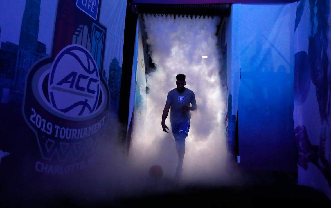 Duke’s Javin DeLaurier (12) leads the team onto the court before Duke’s game against UNC in the semifinals of the 2019 ACC Tournament in Charlotte, N.C., Friday, March 15, 2019.