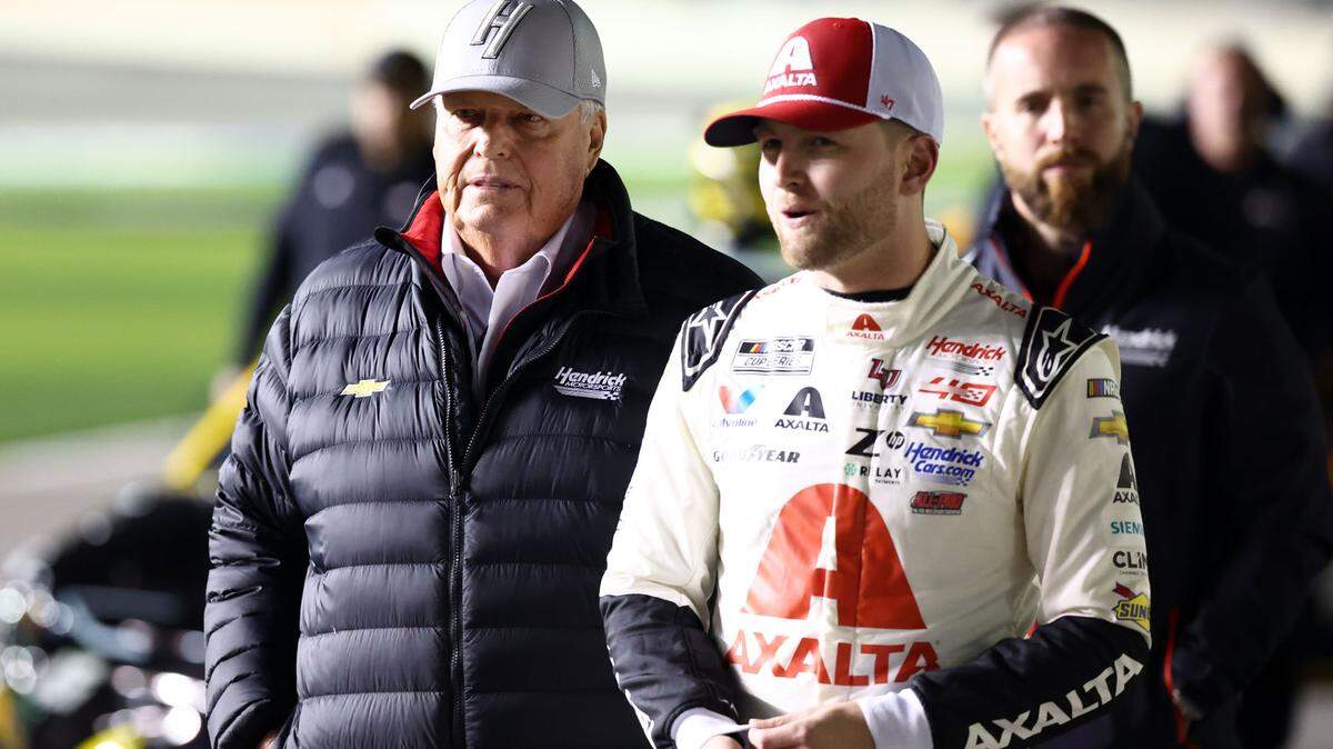 Feb 14, 2024; Daytona Beach, Florida, USA; NASCAR Cup Series driver William Byron (24) and Rick Hendrick (left) walk on pit row during qualifying for the Daytona 500 at Daytona International Speedway. Mandatory Credit: Mark J. Rebilas-USA TODAY Sports