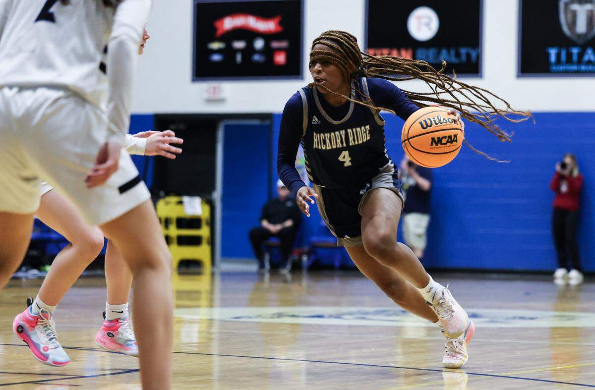 Hickory Ridge Ragin’ Bulls Amya Leathers dribbles up court against the Lake Norman Wildcats at Lake Norman High School in Mooresville, N.C., on Tuesday, February 6, 2024.